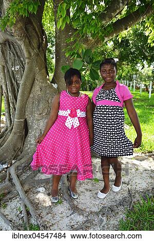 Bahamaian girls nicely dressed for the church, Abacos Islands, Bahamas, Central America View Large Photo Image Picture - Bahamaian girls nicely dressed for the church, Abacos Islands, Bahamas, Central America. Fotosearch