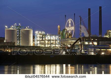 Bayer AG, Chemiewerk on the Rhine, blue hour, Leverkusen, North Rhine-Westphalia, Germany, Europe View Large Photo Image Picture - Bayer AG, Chemiewerk on the Rhine, blue hour, Leverkusen, North Rhine-Westphalia, Germany, Europe. Fotosearch
