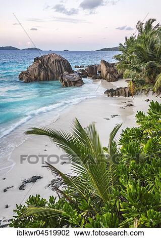Stock Image - Beach and rock formation, La Digue, Indian Ocean, Seychelles, Africa. Fotosearch