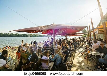 Beach bar Strandperle, Elbe beach, Övelgönne, Hamburg, Germany, Europe View Large Photo Image Stock Image - Beach bar Strandperle, Elbe beach, Övelgönne, Hamburg, Germany, Europe. Fotosearch