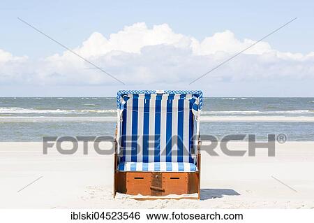 Beach chair on the beach, Amrum, North Frisian Islands, Schleswig-Holstein, Germany, Europe View Large Photo Image Stock Photograph - Beach chair on the beach, Amrum, North Frisian Islands, Schleswig-Holstein, Germany, Europe. Fotosearch