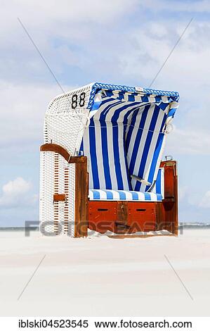 Beach chair on the beach, Amrum, North Frisian Islands, Schleswig-Holstein, Germany, Europe View Large Photo Image Stock Photography - Beach chair on the beach, Amrum, North Frisian Islands, Schleswig-Holstein, Germany, Europe. Fotosearch