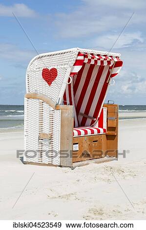 Beach chair with red heart on the beach, Amrum, North Frisian Islands, Schleswig-Holstein, Germany, Europe View Large Photo Image Stock Photo - Beach chair with red heart on the beach, Amrum, North Frisian Islands, Schleswig-Holstein, Germany, Europe. Fotosearch