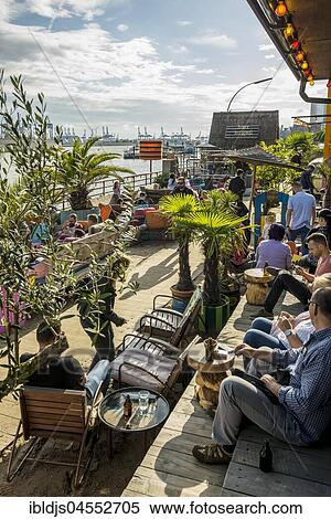 Beach Club Strand Pauli, at the jetties in the Port of Hamburg, Hamburg, Germany, Europe View Large Photo Image Stock Photography - Beach Club Strand Pauli, at the jetties in the Port of Hamburg, Hamburg, Germany, Europe. Fotosearch