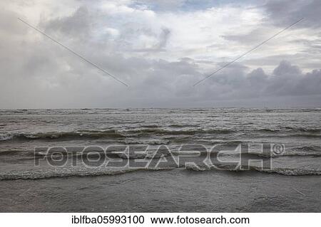 Stock Image - Beach from Cox's Bazaar to monsoon rain, the beach at the Bay of Bengal in southeastern Bangladesh is with a length of 150 km considered the longest natural beach in the world, Cox's Bazaar, Chittagong, Bangladesh, Asia. Fotosearch