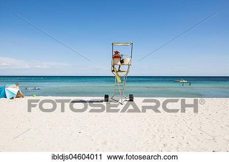 Beachguard at the sandy beach, La plage des Salins, St. Tropez, Var, Cote d' Azur, South of France, France, Europe View Large Photo Image Stock Image - Beachguard at the sandy beach, La plage des Salins, St. Tropez, Var, Cote d' Azur, South of France, France, Europe. Fotosearch