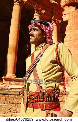 Bedouin Policeman, Khazne al Firaun, Al Khazneh treasury building, Petra, Wadi Musa, Jordan, Asia View Large Photo Image Stock Photo - Bedouin Policeman, Khazne al Firaun, Al Khazneh treasury building, Petra, Wadi Musa, Jordan, Asia. Fotosearch