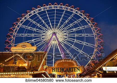 Beer garden in front of ferris wheel, night scene, Cannstatter Volksfest, also Wasen, Bad Cannstatt, Stuttgart, Baden-Württemberg, Germany, Europe View Large Photo Image Stock Image - Beer garden in front of ferris wheel, night scene, Cannstatter Volksfest, also Wasen, Bad Cannstatt, Stuttgart, Baden-Württemberg, Germany, Europe. Fotosearch
