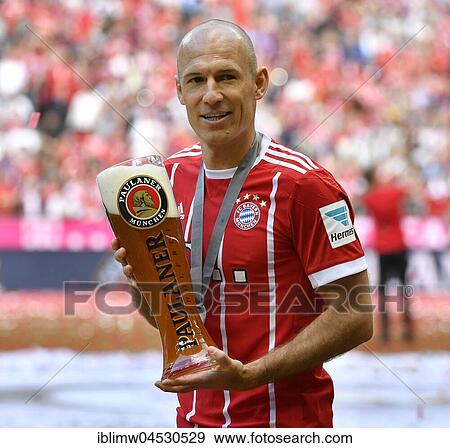 Beer shower with wheat beer, Arjen Robben, FC Bayern Munich, German football championship, Allianz Arena, Munich, Bavaria, Germany, Europe View Large Photo Image Stock Photo - Beer shower with wheat beer, Arjen Robben, FC Bayern Munich, German football championship, Allianz Arena, Munich, Bavaria, Germany, Europe. Fotosearch