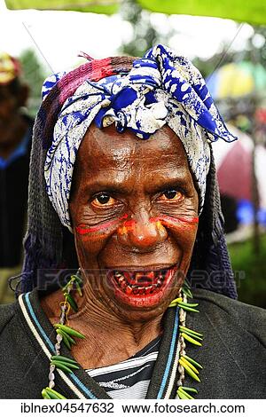 Stock Image - Betel nut seller on the market, Goroka, Papua New Guinea, Oceania. Fotosearch