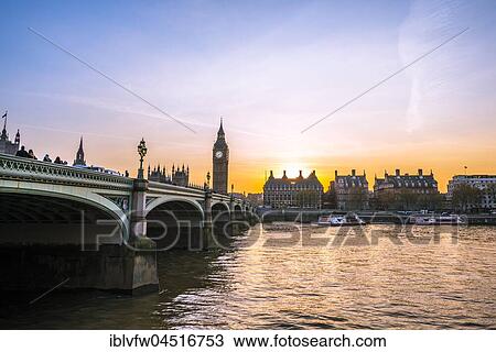 Stock Image - Big Ben, dusk, evening light, sunset, Houses of Parliament, Westminster Bridge, Thames, City of Westminster, London, London region, England, United Kingdom, Europe. Fotosearch
