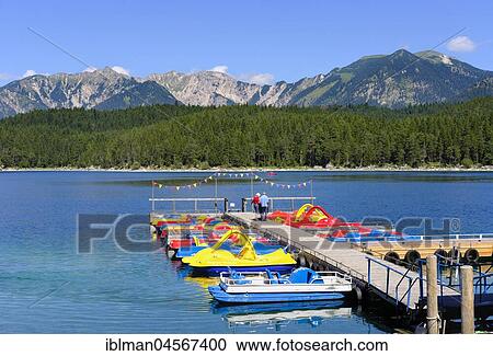 Boat rental, Eibsee lake and Ammergauer Alps with Schellschlicht, Kreuzspitze and Scharfeck, near Grainau, Werdenfelser Land, Upper Bavaria, Bavaria, Germany, Europe View Large Photo Image Stock Image - Boat rental, Eibsee lake and Ammergauer Alps with Schellschlicht, Kreuzspitze and Scharfeck, near Grainau, Werdenfelser Land, Upper Bavaria, Bavaria, Germany, Europe. Fotosearch