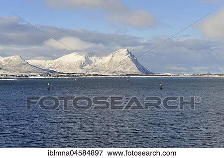 Boat route, fairway with marks in the sea, Risøy Canal, snow-covered peaks on the horizon, near Risøyhamn, Andøya Island, Vesterålen, Nordland, Norway, Europe View Large Photo Image Stock Photo - Boat route, fairway with marks in the sea, Risøy Canal, snow-covered peaks on the horizon, near Risøyhamn, Andøya Island, Vesterålen, Nordland, Norway, Europe. Fotosearch