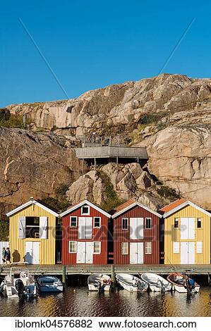 Boats and colourful boathouses in the harbour of Smögen, Smögenbryggan, Västra Götalands Län, Bohuslän, Schwedena View Large Photo Image Stock Image - Boats and colourful boathouses in the harbour of Smögen, Smögenbryggan, Västra Götalands Län, Bohuslän, Schwedena. Fotosearch