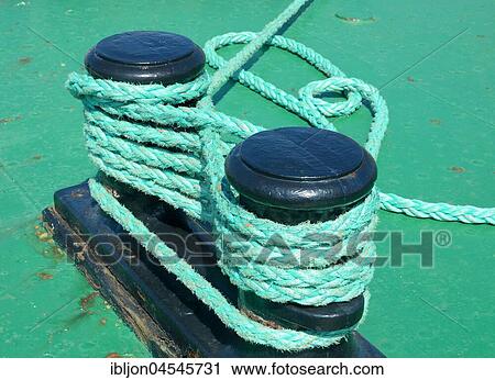Stock Image - Bollard with roap, harbour, Ystad, Sweden, Europe. Fotosearch