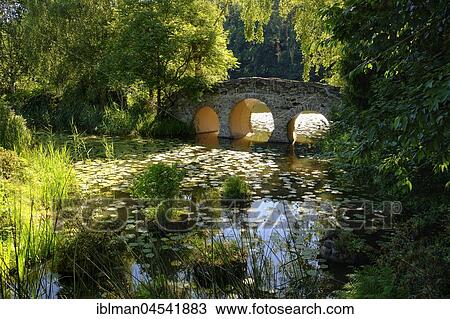 Bridge in the castle park Dennenlohe, Dennenlohe near Unterschwaningen, Franconian Lake District, Middle Franconia, Franconia, Bavaria, Germany, Europe View Large Photo Image Stock Image - Bridge in the castle park Dennenlohe, Dennenlohe near Unterschwaningen, Franconian Lake District, Middle Franconia, Franconia, Bavaria, Germany, Europe. Fotosearch