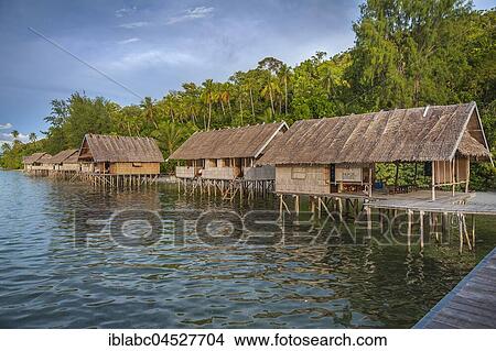 Picture - Bungalows, Papua Diving Resort, Kri Island in the Dampier Strait, West Papua, Indonesia, Asia. Fotosearch