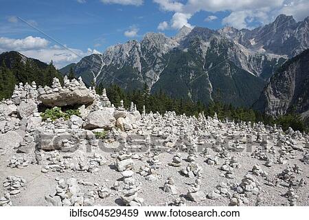 Cairns, mountain chain between Kranjska Gora and Trenta, Triglav National Park, Julian Alps, Slovenia, Europe View Large Photo Image Stock Photo - Cairns, mountain chain between Kranjska Gora and Trenta, Triglav National Park, Julian Alps, Slovenia, Europe. Fotosearch