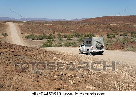 Camper on dusty route C43, near Palmwag, Damaraland, Namibia, Africa View Large Photo Image Stock Image - Camper on dusty route C43, near Palmwag, Damaraland, Namibia, Africa. Fotosearch