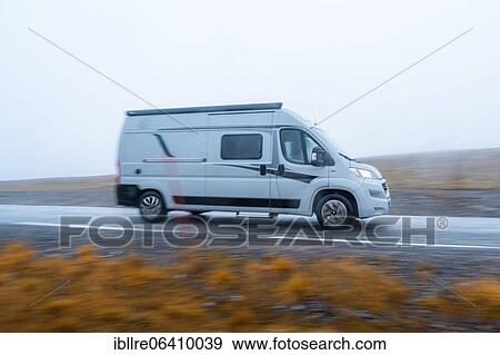 Campervan in fast drive on a road near the North Cape, North Cape, Norway, Europe View Large Photo Image Stock Photo - Campervan in fast drive on a road near the North Cape, North Cape, Norway, Europe. Fotosearch