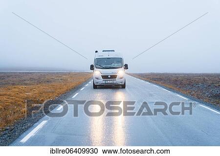 Campervan with bright lights on road near the North Cape, North Cape, Norway, Europe View Large Photo Image Stock Image - Campervan with bright lights on road near the North Cape, North Cape, Norway, Europe. Fotosearch