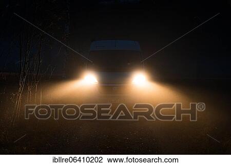 Campervan with bright lights standing in the fog, Trollstigen, Norway, Europe View Large Photo Image Stock Image - Campervan with bright lights standing in the fog, Trollstigen, Norway, Europe. Fotosearch