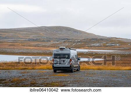 Campervan with rear view stands on parking lot near Kåfjord, North Cape, Norway, Europe View Large Photo Image Stock Image - Campervan with rear view stands on parking lot near Kåfjord, North Cape, Norway, Europe. Fotosearch