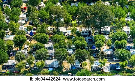 Camping with caravans and tents, Camping La Quercia, Lazise, Lake Garda, Veneto, Italy, Europe View Large Photo Image Picture - Camping with caravans and tents, Camping La Quercia, Lazise, Lake Garda, Veneto, Italy, Europe. Fotosearch