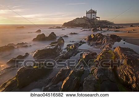 Capela do Senhor da Pedra, chapel at sunset, rocky beach, Portugal, Europe View Large Photo Image Stock Image - Capela do Senhor da Pedra, chapel at sunset, rocky beach, Portugal, Europe. Fotosearch