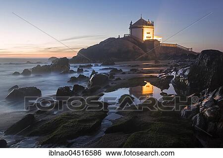 Capela do Senhor da Pedra, Chapel at dusk, rocky beach, Portugal, Europe View Large Photo Image Stock Photograph - Capela do Senhor da Pedra, Chapel at dusk, rocky beach, Portugal, Europe. Fotosearch