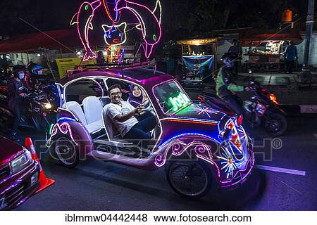 Car illuminated with colourful LEDs, pedal car, Yogyakarta, Indonesia, Asia View Large Photo Image Stock Photo - Car illuminated with colourful LEDs, pedal car, Yogyakarta, Indonesia, Asia. Fotosearch