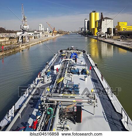 Cargo ship on the Datteln-Hamm Canal in city port, Hamm, Ruhr district, North Rhine-Westphalia, Germany, Europe View Large Photo Image Stock Photo - Cargo ship on the Datteln-Hamm Canal in city port, Hamm, Ruhr district, North Rhine-Westphalia, Germany, Europe. Fotosearch