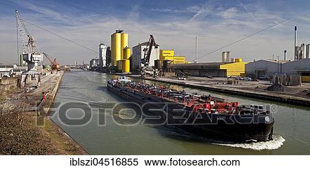 Cargo ship on the Datteln-Hamm Canal in city port, Hamm, Ruhr district, North Rhine-Westphalia, Germany, Europe View Large Photo Image Stock Photography - Cargo ship on the Datteln-Hamm Canal in city port, Hamm, Ruhr district, North Rhine-Westphalia, Germany, Europe. Fotosearch