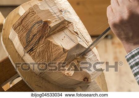 Carving a wooden block, shaping a face, wooden mask carver, Bad Aussee, Styria, Austria, Europe View Large Photo Image Picture - Carving a wooden block, shaping a face, wooden mask carver, Bad Aussee, Styria, Austria, Europe. Fotosearch