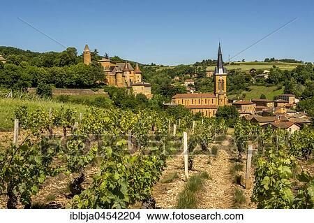 Castle and church of Jarnioux, Village of Pierres Dorées, Beaujolais, Rhone, Auvergne-Rhône-Alpes region, France, Europe View Large Photo Image Picture - Castle and church of Jarnioux, Village of Pierres Dorées, Beaujolais, Rhone, Auvergne-Rhône-Alpes region, France, Europe. Fotosearch
