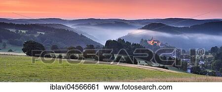 Castle and village Lauenstein, panorama, sunrise, morning mist, Ludwigsstadt, Upper Franconia, Bavaria, Germany, Europe View Large Photo Image Stock Image - Castle and village Lauenstein, panorama, sunrise, morning mist, Ludwigsstadt, Upper Franconia, Bavaria, Germany, Europe. Fotosearch