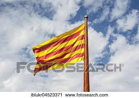 Catalan flag waving in the wind, Barcelona, Spain View Large Photo Image Stock Image - Catalan flag waving in the wind, Barcelona, Spain. Fotosearch