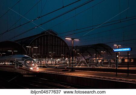 Central Station Amsterdam Centraal at night, Amsterdam, Netherlands View Large Photo Image Stock Photo - Central Station Amsterdam Centraal at night, Amsterdam, Netherlands. Fotosearch