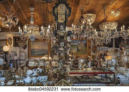 Stock Image - Chandeliers and bric-a-brac, Auer Dult, Munich, Upper Bavaria, Bavaria, Germany, Europe. Fotosearch