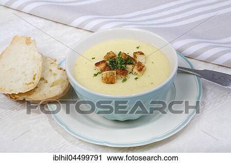 Cheese soup with herb croutons, plate, bowl, bread slices View Large Photo Image Stock Image - Cheese soup with herb croutons, plate, bowl, bread slices. Fotosearch