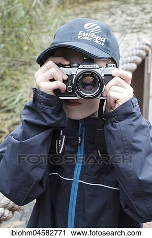 Child photographed with reflex camera, Germany, Europe View Large Photo Image Stock Image - Child photographed with reflex camera, Germany, Europe. Fotosearch