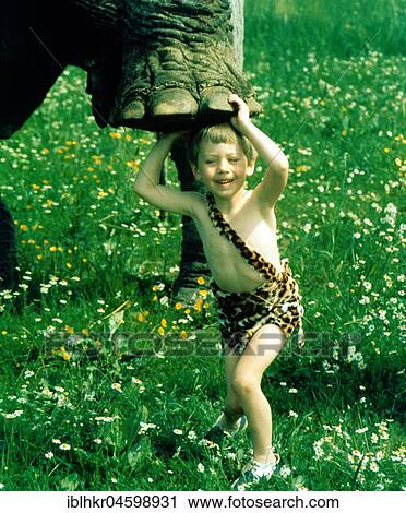 Child under elephant foot, England, Great Britain View Large Photo Image Stock Image - Child under elephant foot, England, Great Britain. Fotosearch