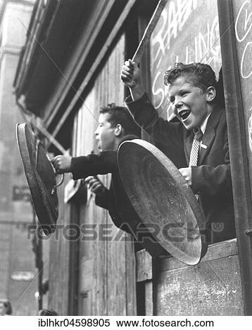 Stock Photography - Children with shield and stick, England, Great Britain. Fotosearch