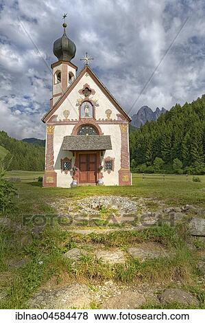 Stock Photo - Church St. Johann in Ranui with Odle Group mountain range, Villnöß valley, Alto Adige, Italy, Europe. Fotosearch