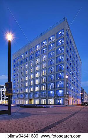Stock Photo - City library at dusk, architect Eun Young Yi, Mailänder Platz, Europaviertel, Stuttgart, Baden-Württemberg, Germany, Europe. Fotosearch