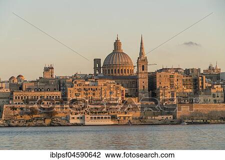 City view with St. Paul's Pro Cathedral and Carmelite Church, evening light, Valletta, Malta, Europe View Large Photo Image Stock Image - City view with St. Paul's Pro Cathedral and Carmelite Church, evening light, Valletta, Malta, Europe. Fotosearch