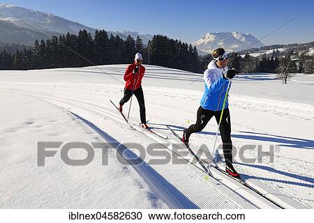 Classic cross-country skiers on the cross-country ski run, cross-country stadium, Reit im Winkl, Chiemgau, Upper Bavaria, Bavaria, Germany, Europe View Large Photo Image Stock Image - Classic cross-country skiers on the cross-country ski run, cross-country stadium, Reit im Winkl, Chiemgau, Upper Bavaria, Bavaria, Germany, Europe. Fotosearch