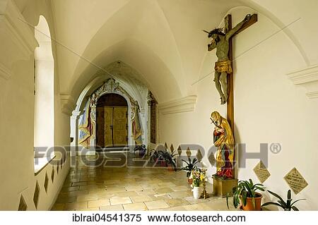 Cloister with Christ on the cross and stuccoed entrance to St. Cross Chapel, Cloister Scheyern, Benedictine Abbey, Pfaffenhofen an der Ilm, Upperbavaria, Bavaria, Germany, Europe View Large Photo Image Stock Photography - Cloister with Christ on the cross and stuccoed entrance to St. Cross Chapel, Cloister Scheyern, Benedictine Abbey, Pfaffenhofen an der Ilm, Upperbavaria, Bavaria, Germany, Europe. Fotosearch