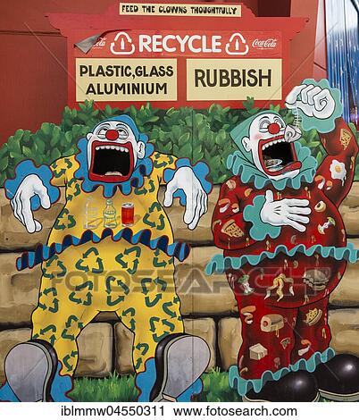 Stock Image - Clowns eating trash, caricature on a trash can, trash separation, recycling, Luna Park, Sydney, Australia, Oceania. Fotosearch