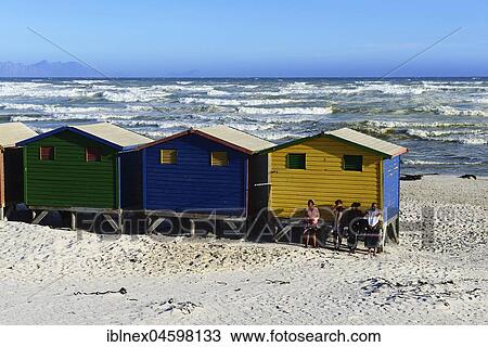 Stock Image - Colorful beach cottages on the sandy beach, Muizenberg, False Bay, Western Cape, South Africa, Africa. Fotosearch